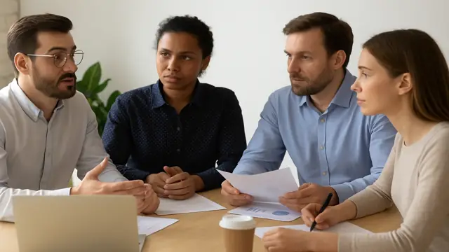 SEO team discussing ethical link-building strategies collaboratively.